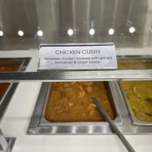 a variety of food in a buffet