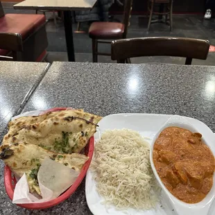 Meat Tikka Masala (chicken) and garlic naan.