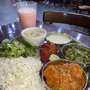 I got all this food for just $14.99!! The Meat Thali was FANTASTIC!! And I always get a rose milk with my meal.