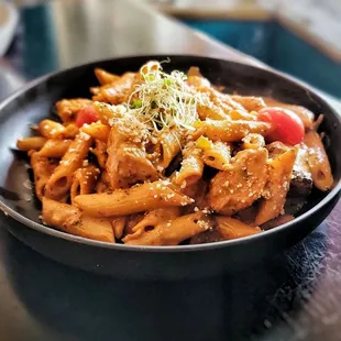 Butter Chciken Pasta - Penna pasta creamy tomato butter sauce, onion, peppers, oregano, parmesan cheese, seasonning