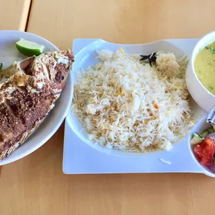 Whole fried red snapper set meal - with daal, basmati rice and salad.  01/28/2017
