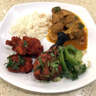 A Few Lunch Buffet Items (Clockwise from Lower Left - Chicken 65, Basmati Rice, Spicy Chicken Jalfrezi, and Tandoori Chicken)