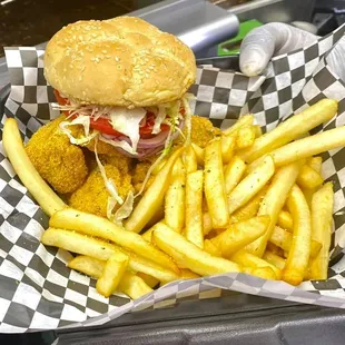a burger and fries in a basket