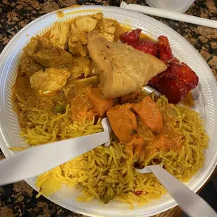 Spicy rice, samosa, chicken 65, and Marsala