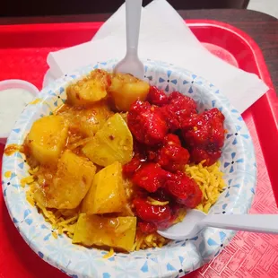 Chicken 65 with rice and potatoes.