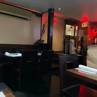 a restaurant with tables and chairs