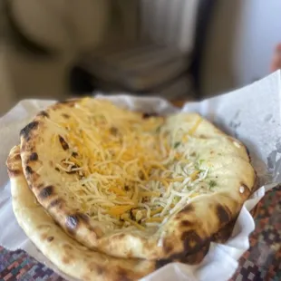 Garlic cheese naan with unmelted cheese