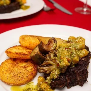 Grilled Filet Mignon topped with Peach Chimichurri. Side of Crispy Polenta