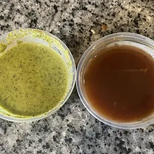 Cilantro chutney dipping sauce and idk what the other sauce is it's a bit sweet but nummy :)
