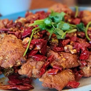 Fried chicken with chili peppers