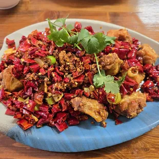 Chicken wings with explosive peppers