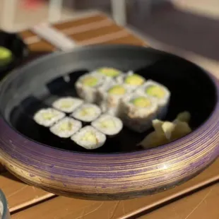 a plate of sushi on a table