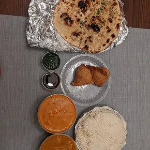 Garlic naan, chicken tiki masala, samosa, chicken vindaloo