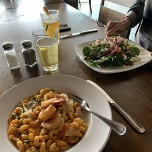 Pasta with shrimp, vodka tomato sauce. Spicewood salad. Two on tap beers
