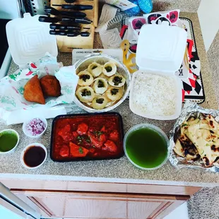 I got Samosa, Chicken Vindaloo, Pani Puri, and garlic naan  Stunning.