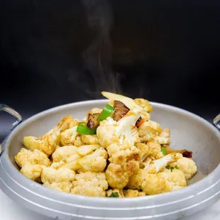 a steaming cauliflower dish