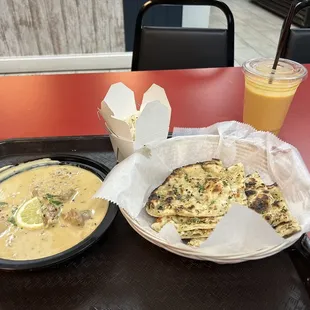 Lemon Spicy Chicken, garlic Naan, rice, Mango Lasi!