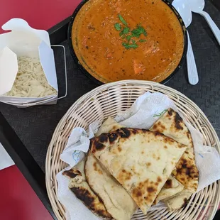 Butter chicken with rice and naan