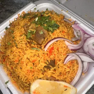 Goat biryani come with side of raita