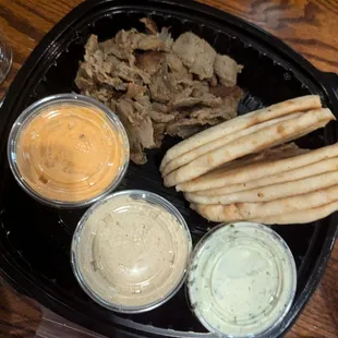 Mezze Sampler-pita, shawarma, spicy feta dip, tzatziki, hummus