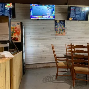 a table and chairs in a restaurant