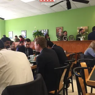 a group of people sitting at a table