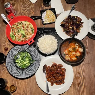 Rice, Cucumber salad, Green onion pancake, House cold noodle, Eggplant with garlic sauce , Wonton with spicy chili oil Orange chicken