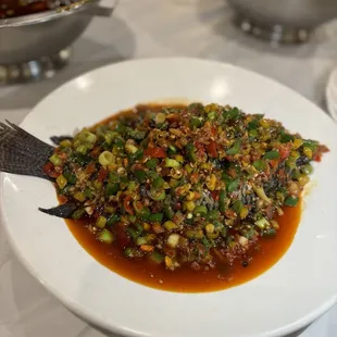a white plate of food on a table