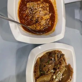 two bowls of food on a table