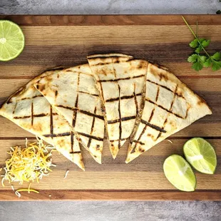 Jerk chicken quesadilla served with jerk dipping sauce. Mmmm.