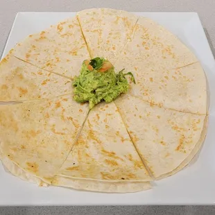 a tortilla with guacamole