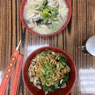 Spicy lamb omasa dry noodles and the lamb innards noodle soup (both hand pulled wide noodles)