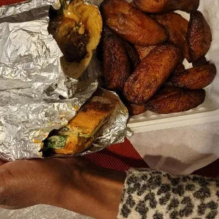 Beef kabob sandwich with fried plantains, side sauce. Sandwich must be at least 12 in or more. I'm thinking more.