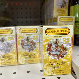 three boxes of food on a shelf