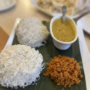 String hoppers with dhal (lentils) and coconut sambol