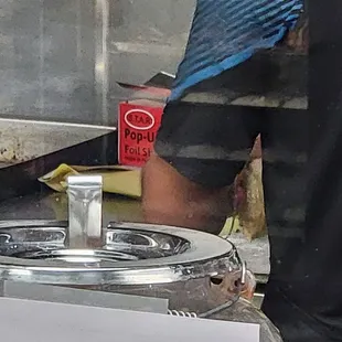 No gloves on rolling burrito