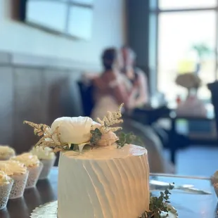 Wedding cake and cupcakes