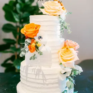 a wedding cake with flowers