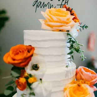 a wedding cake with flowers