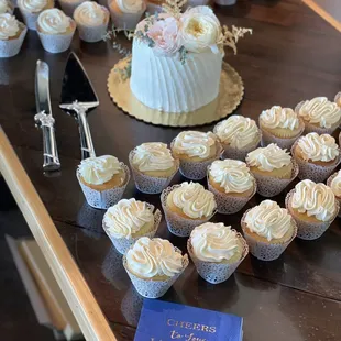 Wedding cake and cupcakes