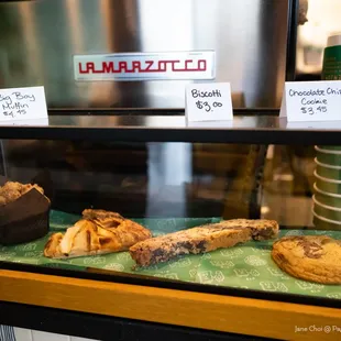 a display of coffee and pastries