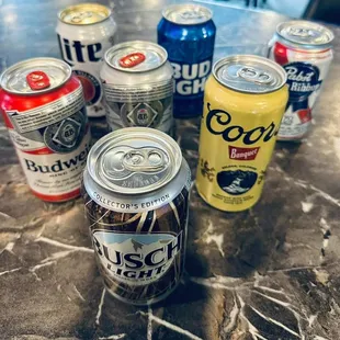 a variety of cans of beer