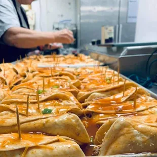 a tray of food being prepared