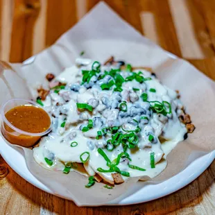Nachos - choice of Chicken or Beef made with housemade pepperjack cheese sauce