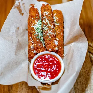 Mozzarella Sticks - hand breaded with housemade marinara pomodoro dipping sauce