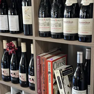 a shelf full of wine bottles