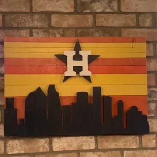 a houston skyline with a star on it