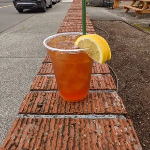 Iced tea, ironically, "on the wall". This is during their outdoor-only seating phase, with all tables occupied.