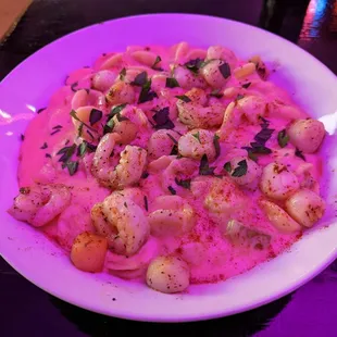 Orecchiette pasta with lobster sauce, scallops, and shrimp