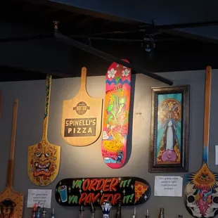 a variety of pizzas and paddles